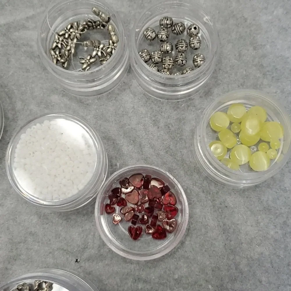 Beads and charms and beads and charms lot